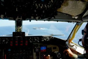 KC-135R makes low approach near USS John C. Stennis at RIMPAC