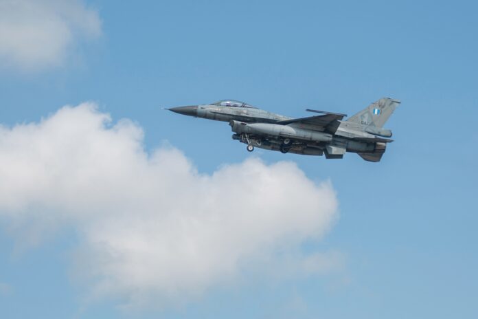 A Hellenic air force pilot assigned to the 347th Fighter Squadron, Greece, prepares to land an F-16 Fighting Falcon aircraft at Lechfeld Air Base, Germany after a joint flight mission with the Idaho National Guard and Greek air force counterparts during exercise Air Defender 2023 (AD23), June 14, 2023. Exercise AD23 integrates both U.S. and allied air-power to defend shared values, while leveraging and strengthening vital partnerships to deter aggression. (U.S. Air National Guard photo by Master Sgt. Becky Vanshur)